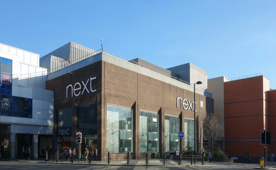 Next Raises Annual Profit Forecast After Strong Summer Sales Boost Performance