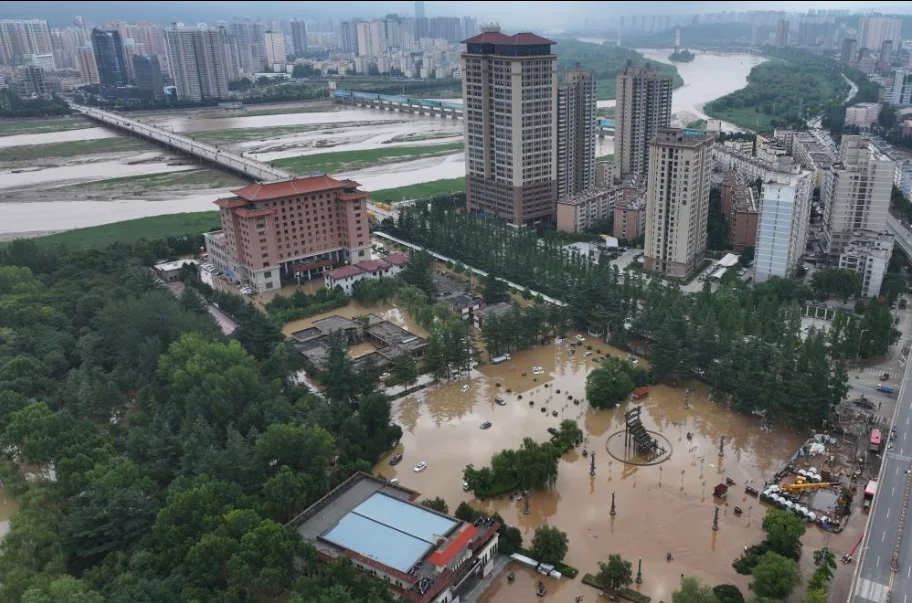 Floods Tear Apart Roads as More Than 25,000 People Flee Their Homes in China